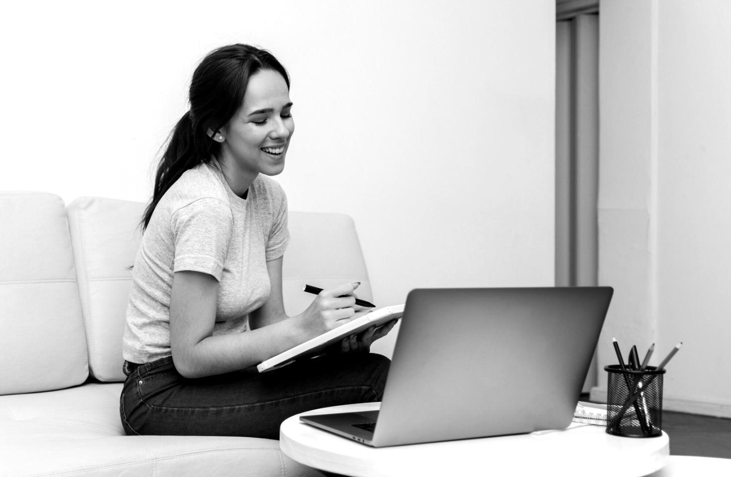Journalists collaborating at a workstation