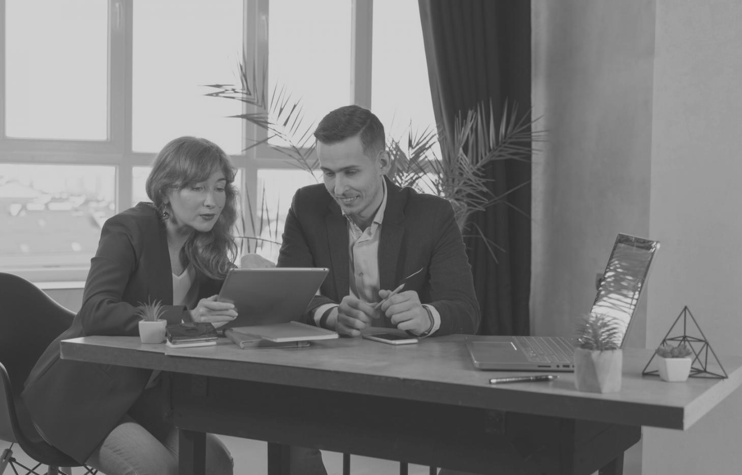 A journalist taking notes during an interview